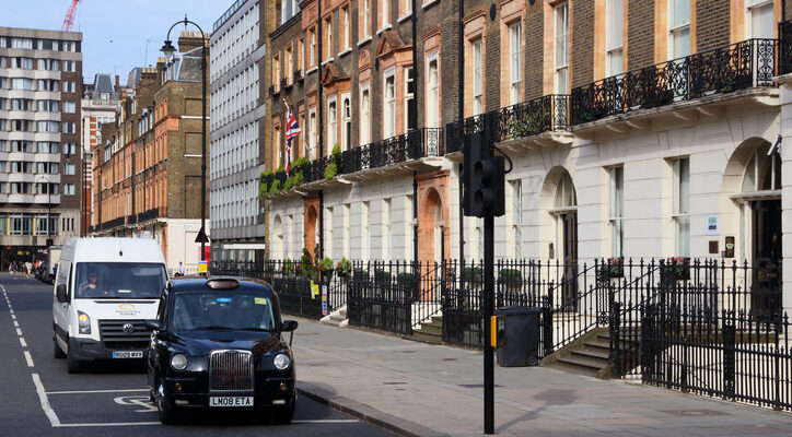 The Hackney Carriage'S Signature Look 1 Black hackney cab in Russell Square, London, UK.